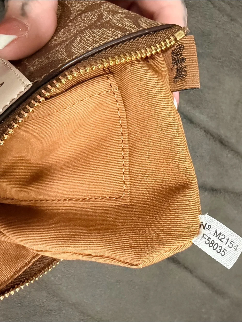 Authentic Coach Tan Signature Canvas Wristlet with Cream Center Stripe
